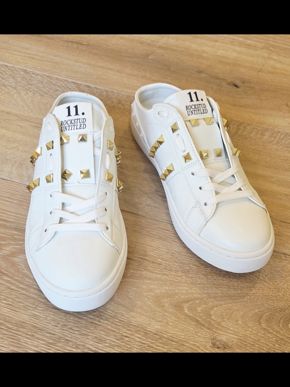 Women's White Leather Slide Sneakers with Gold Rockstud Accents - Size 8